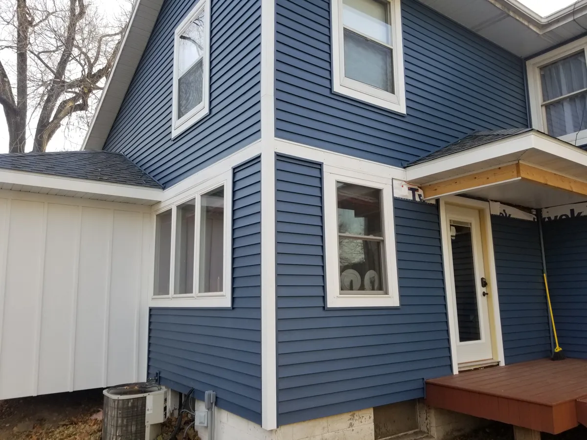 House with vinyl siding and LP SmartSide accent