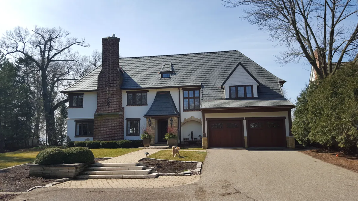 Synthetic slate roof installed by Ace Exterior Solutions